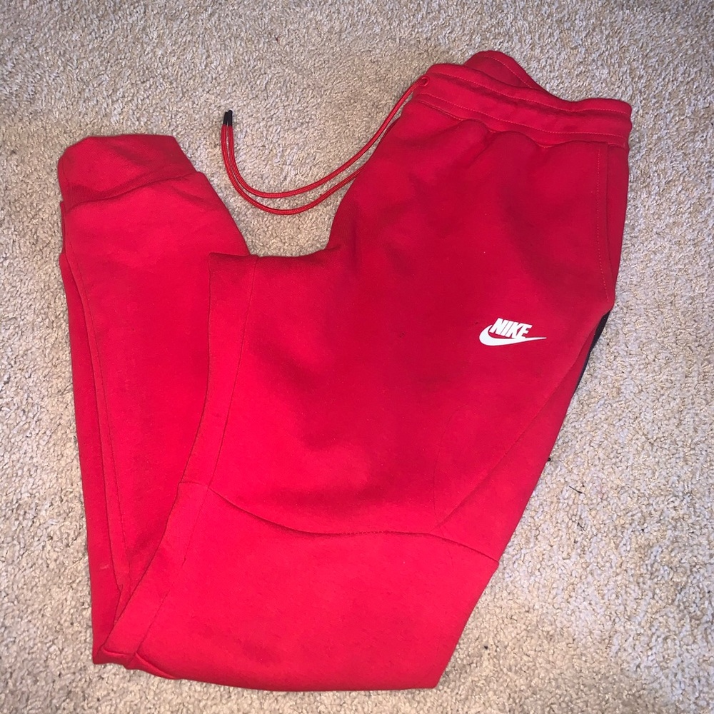 Red Nike jogger pants